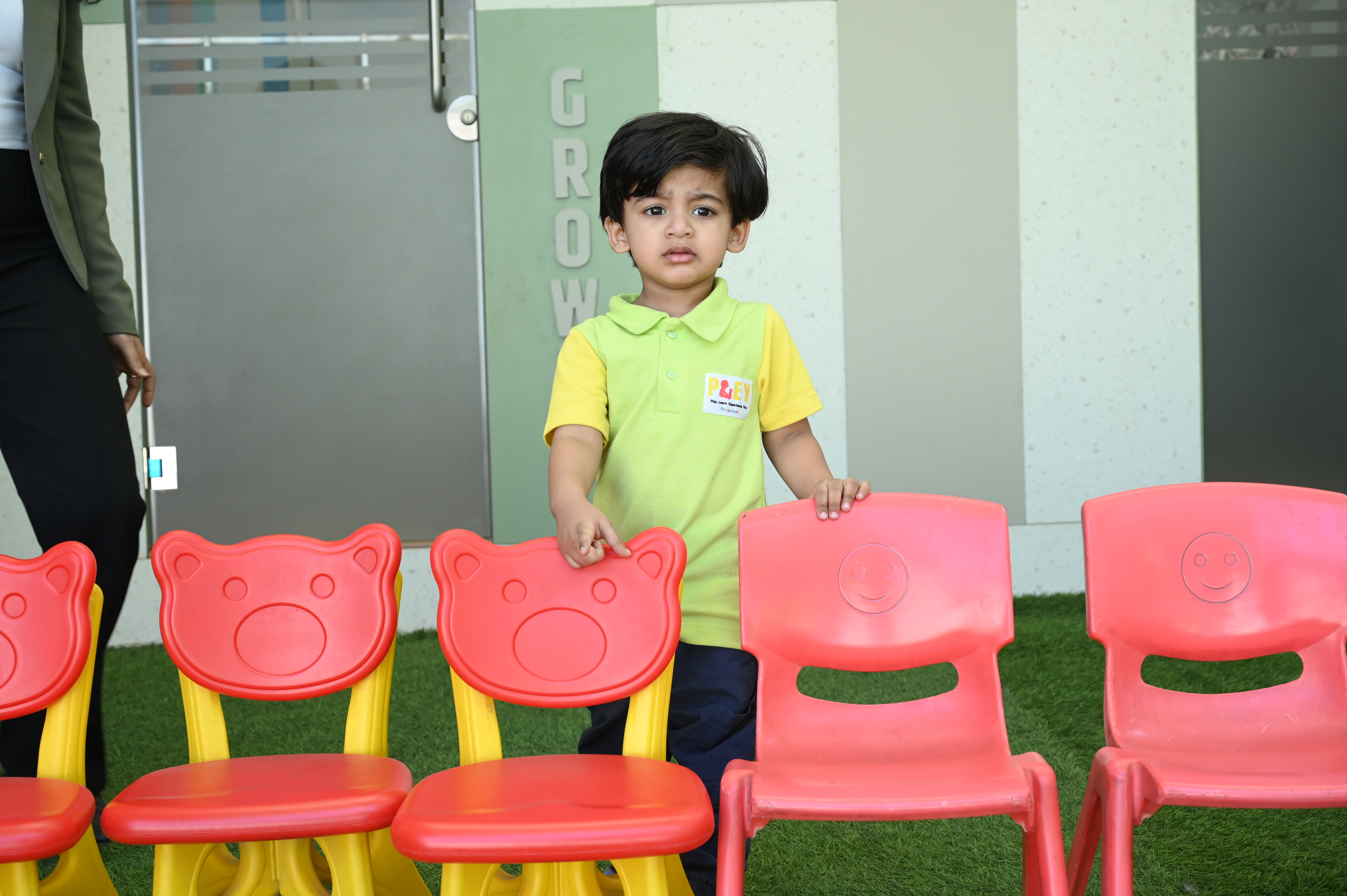 Teacher teaching child